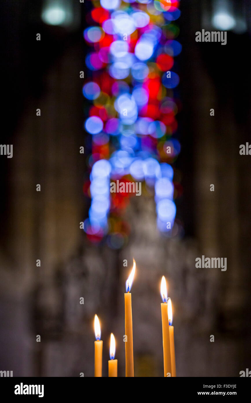 Candles buring in church Stock Photo