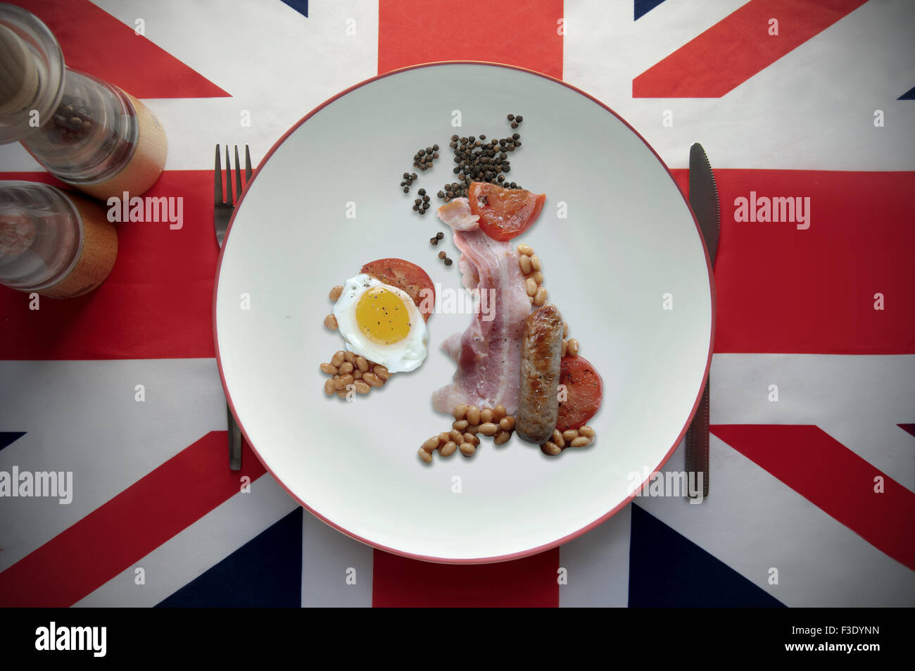 English breakfast in the shape of the United kingdom on top of a British flag table cloth Stock Photo