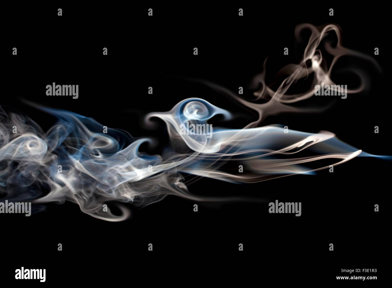 Smoke over the black background Stock Photo - Alamy