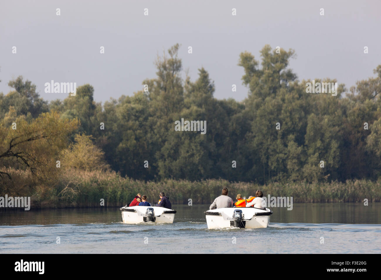 Family sailing rent boats in National park 'the Biesbosch' in the Netherlands Stock Photo