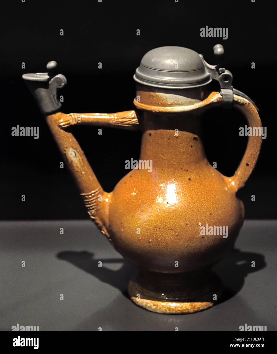 Spouted Jug Raeren 1580 German Germany ( Spout is shaped like human arm ) Raeren is a municipality located in the Belgian province of Liège Stock Photo
