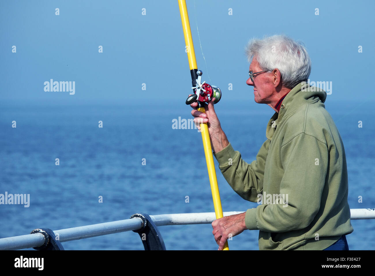 Red anodized Sea Fishing trolling reel. 6 to 1 multiplier for jigging and  general bottom fishing Stock Photo - Alamy