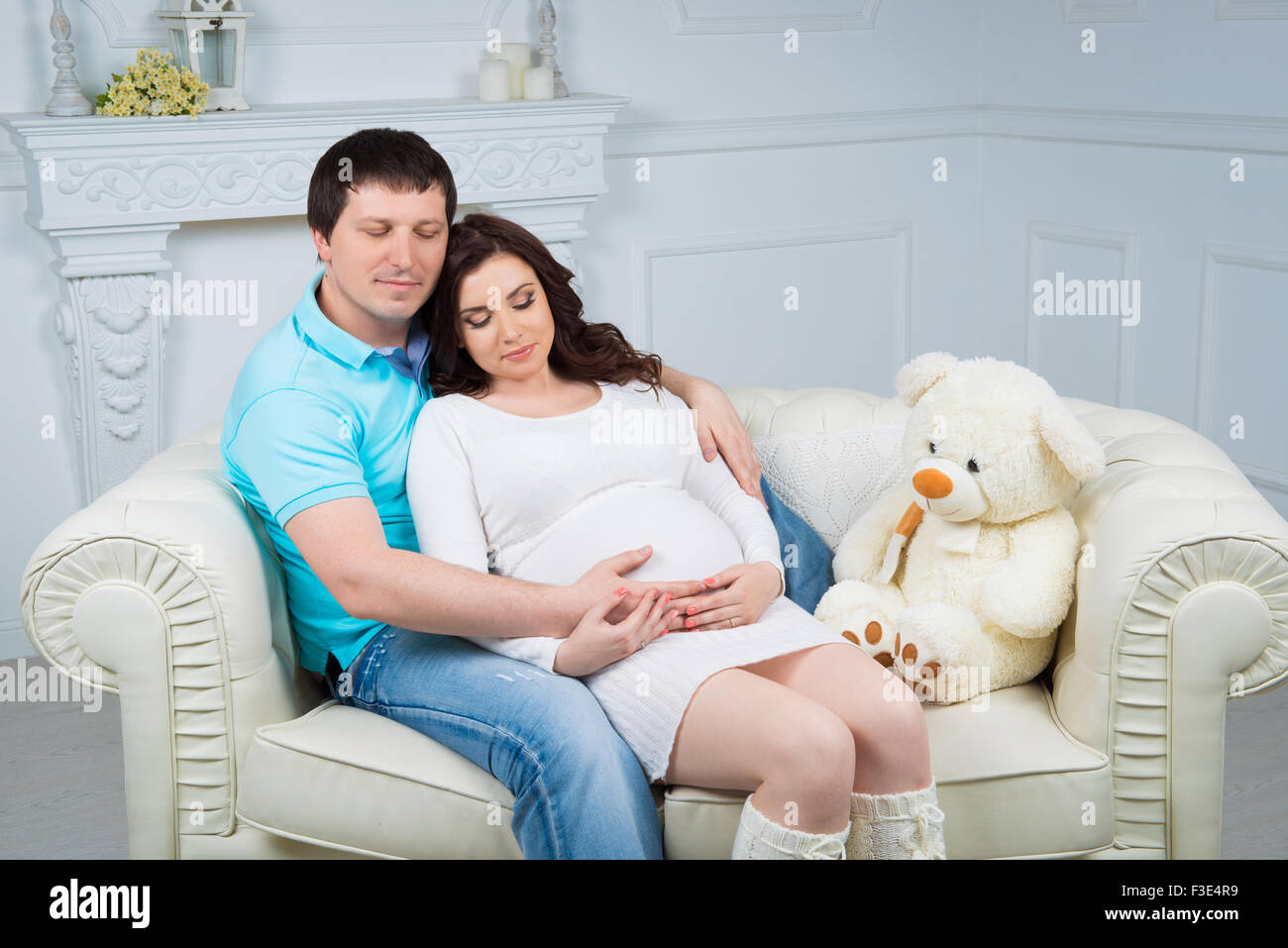 Pregnant family, young happy couple expecting a baby Stock Photo - Alamy