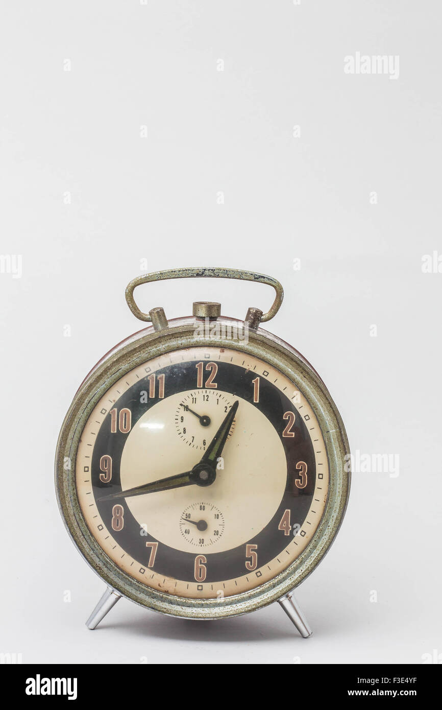 Old clock on a white background Stock Photo - Alamy
