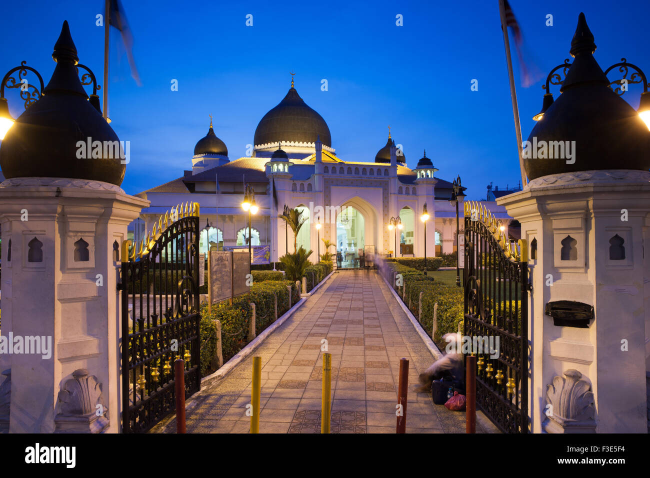 Georgetown, Malaysia — 04 August, 2014: The view of Kapitan Keling Mosque after sunset in Georgetown, Penang, Malaysia on 04 Aug Stock Photo