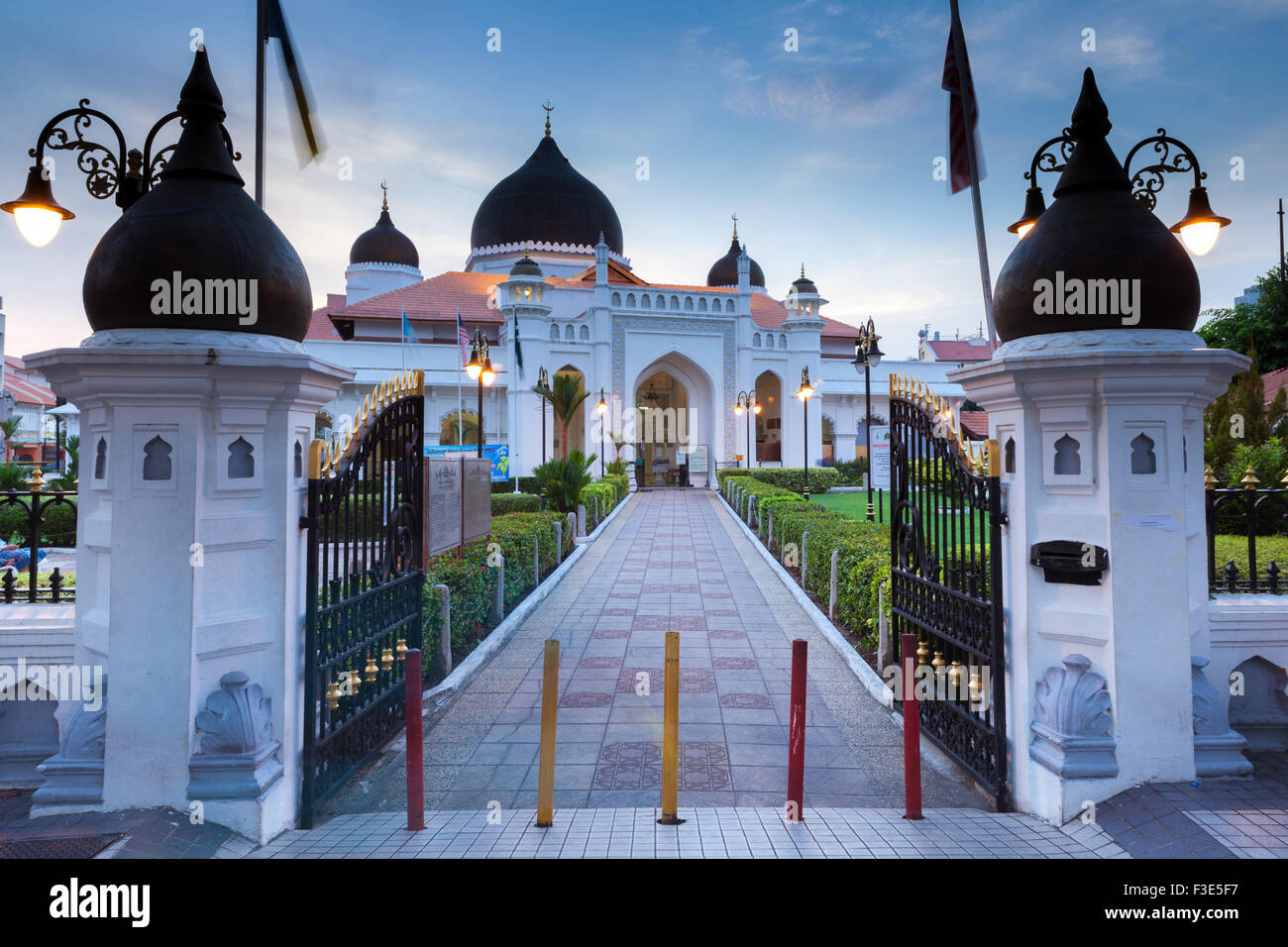 Georgetown, Malaysia — 04 August, 2014: The view of Kapitan Keling Mosque after sunset in Georgetown, Penang, Malaysia on 04 Aug Stock Photo