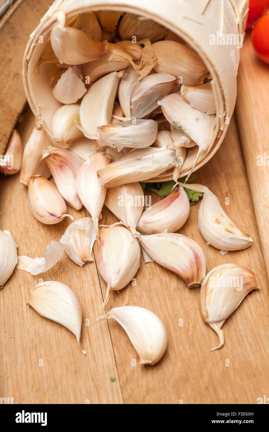 Organic garlic on old wood Stock Photo