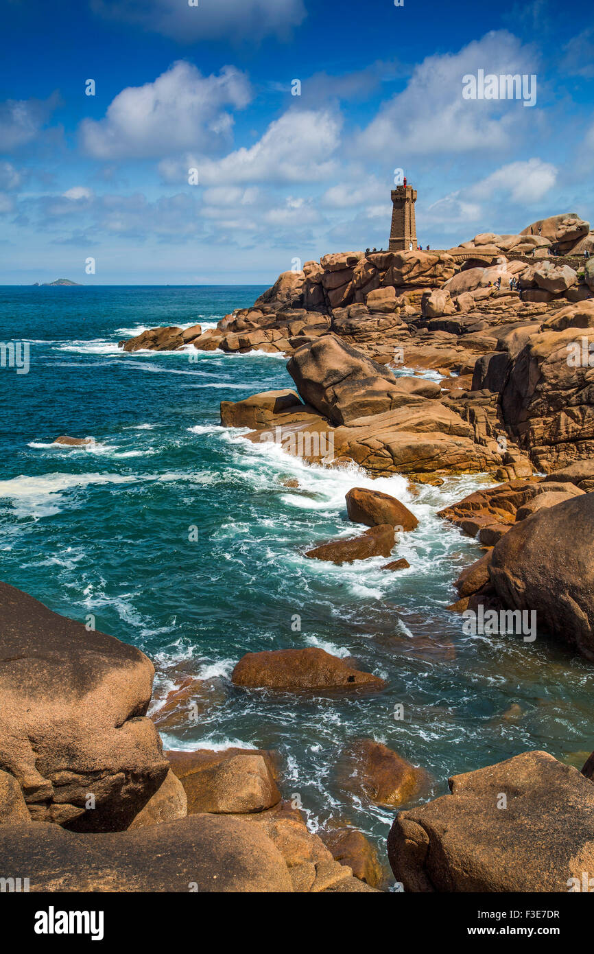 Phare de Mean Ruz lighthouse giant rocks at the Cote granit rose pink granite coast Ploumanac´h Perros Guirec French Brittany Fr Stock Photo