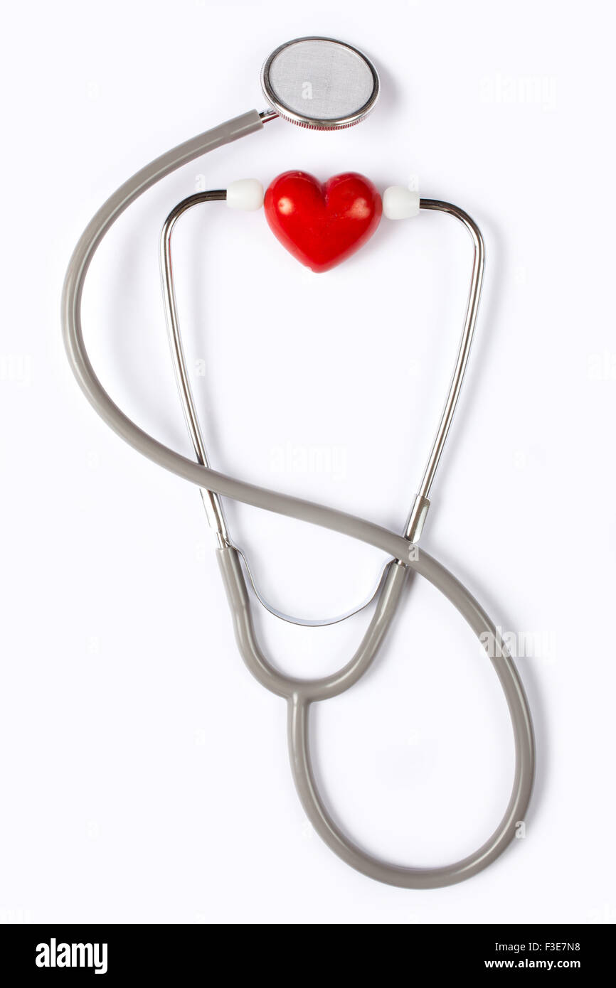 Stethoscope & red heart on white background Stock Photo - Alamy