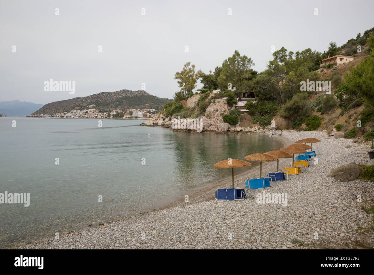Kastraki, Greece with a small gravel beach that is located near Tolo, just below the excavations in Asini. Stock Photo