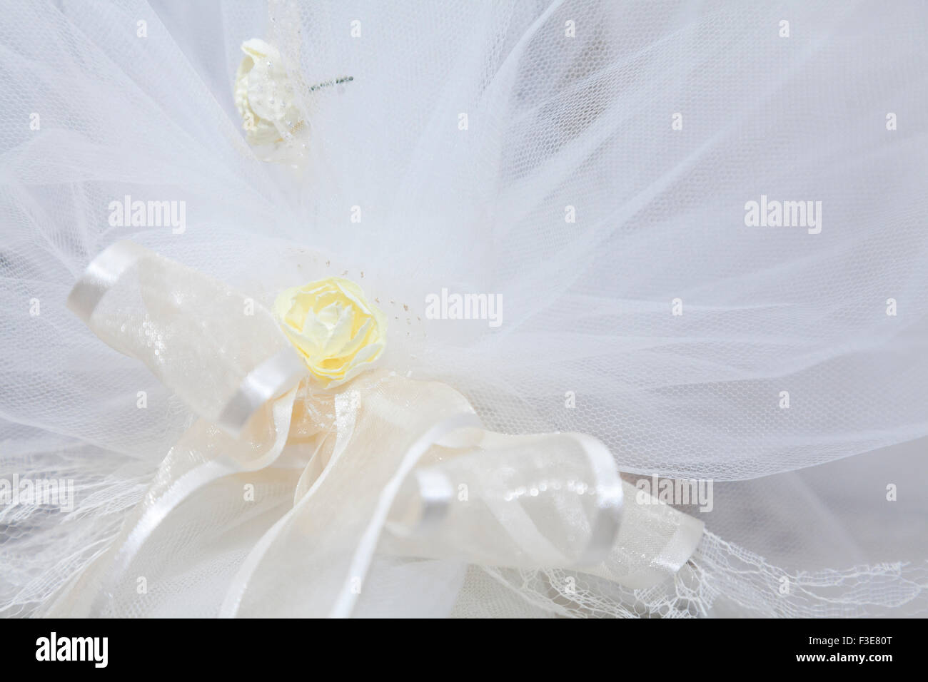 Elegant Wedding Favors decorated with artificial flowers Stock Photo Alamy
