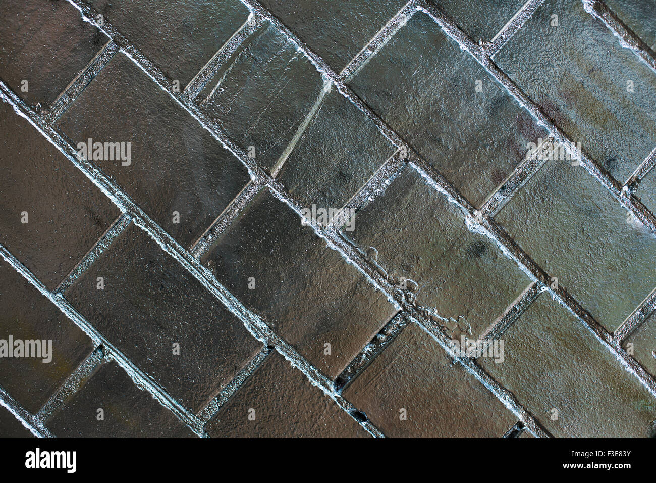 Sloping Bricks Silver sloping brick wall - horizontal background Stock Photo - Alamy