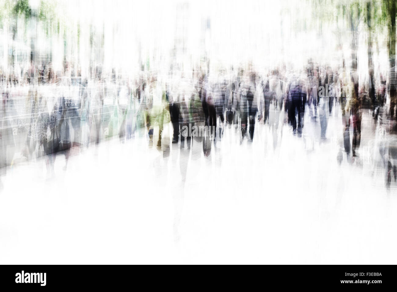 unrecognizable crowd of people walking in pedestrian zone with motion blur Stock Photo