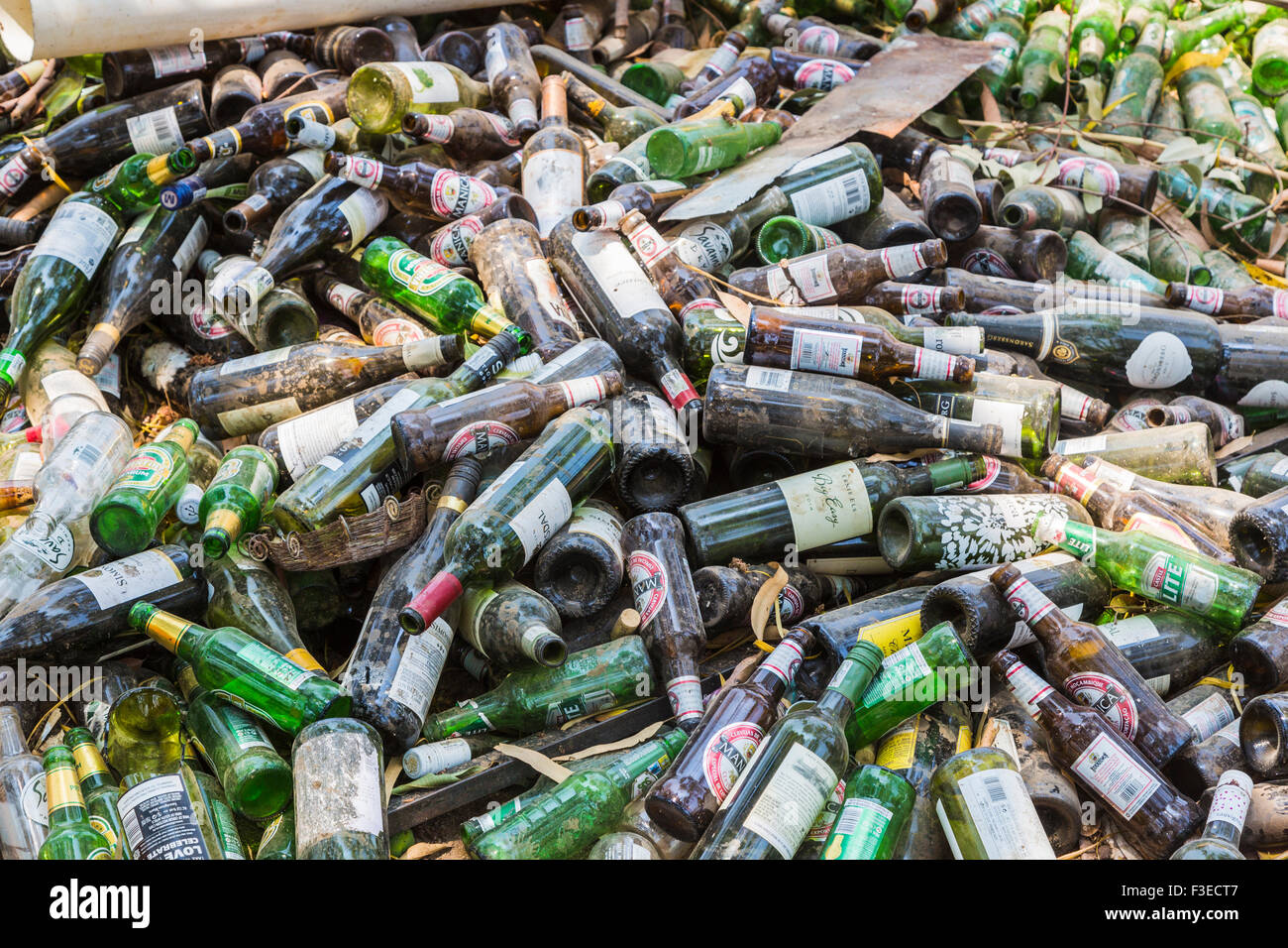 Pile of dusty empty beer and wine bottles at Katundu creative trade