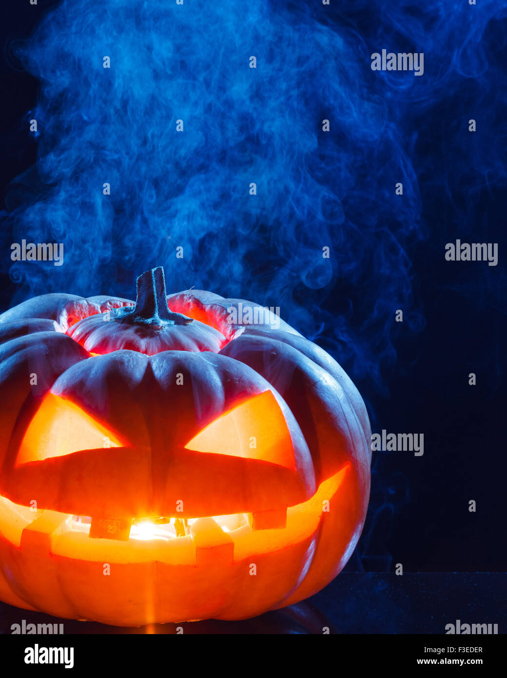 terrible pumpkin on black background Stock Photo