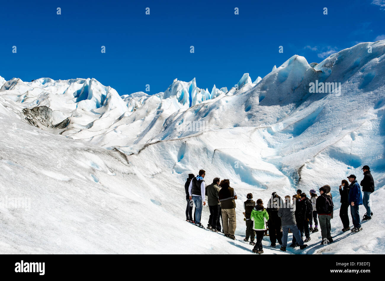 People hiking on ice, Perito Moreno glacier, Perito Moreno National Park, Patagonia, Argentina, South America Stock Photo