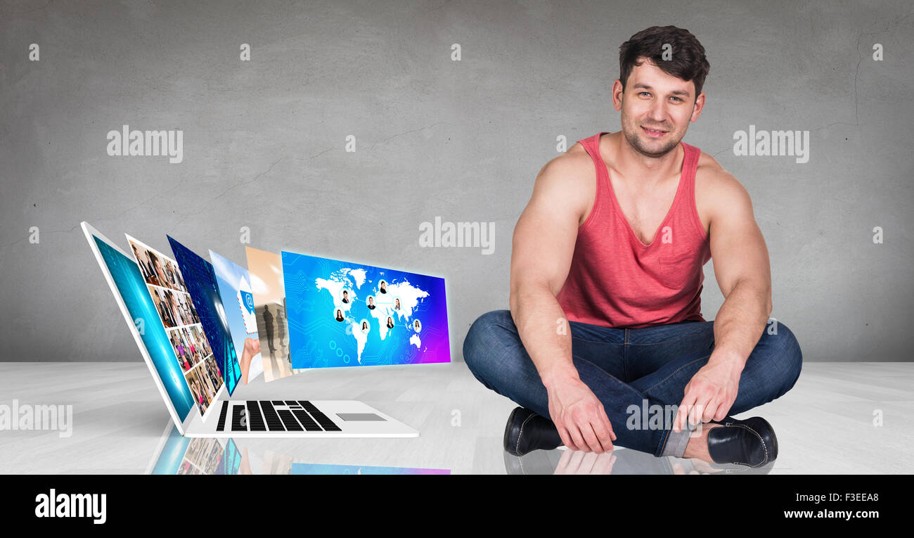 Laptop stands on the floor Stock Photo
