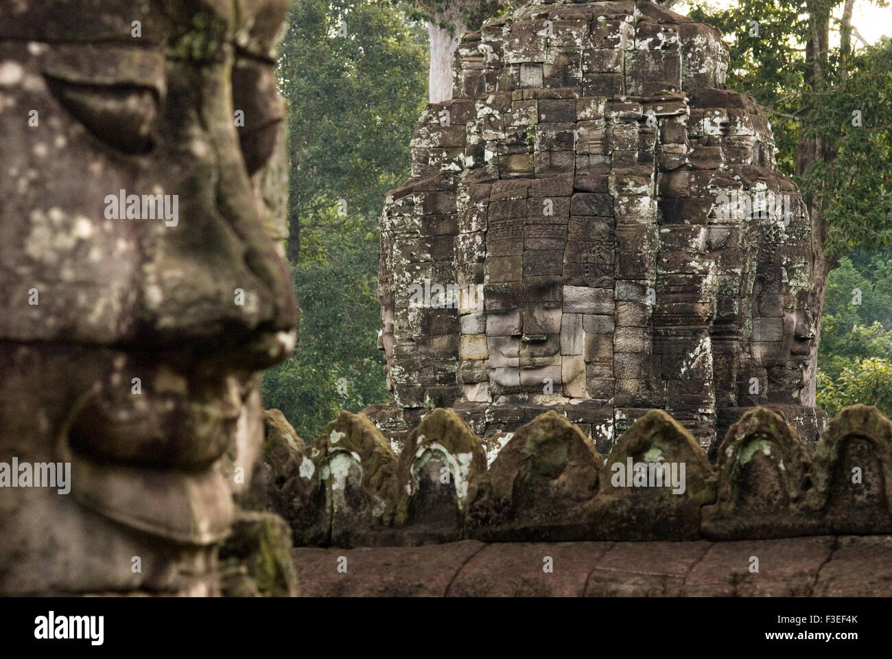 The faces of the Bayon temple. Angkor Thom. Angkor Thom was built as a square, the sides of which run exactly north to south and Stock Photo