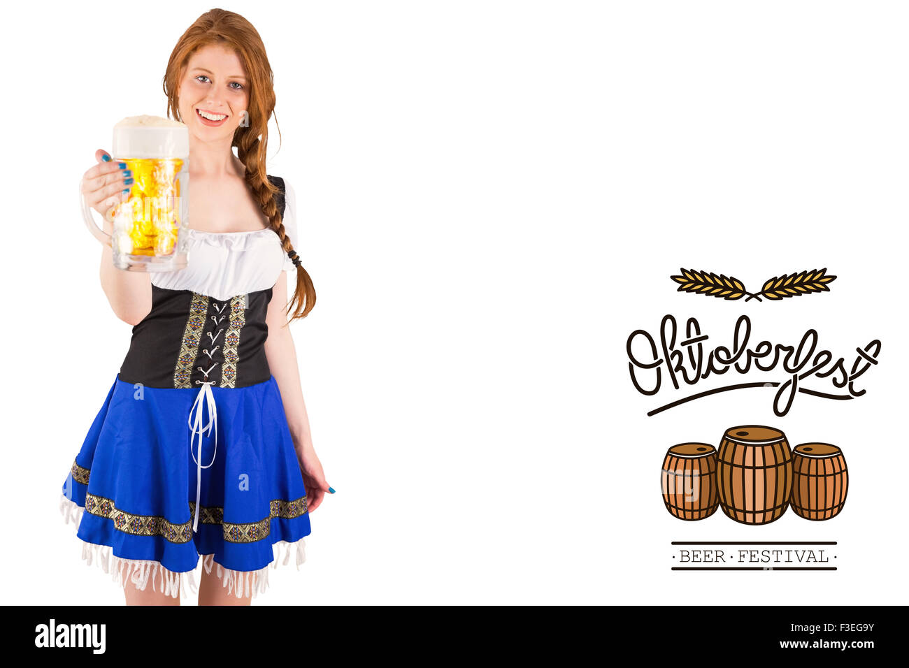 Composite image of oktoberfest girl smiling at camera holding beer Stock Photo