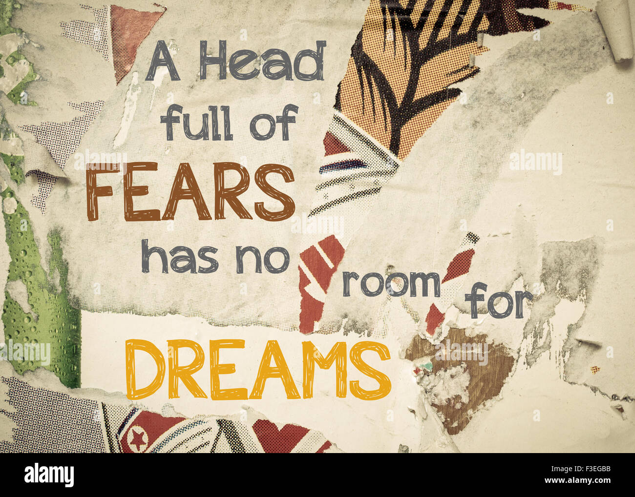 A Head Full Of Fears Has No Room For Dreams- Inspirational message written on vintage grunge background with Old Torn Posters. Motivational concept image Stock Photo