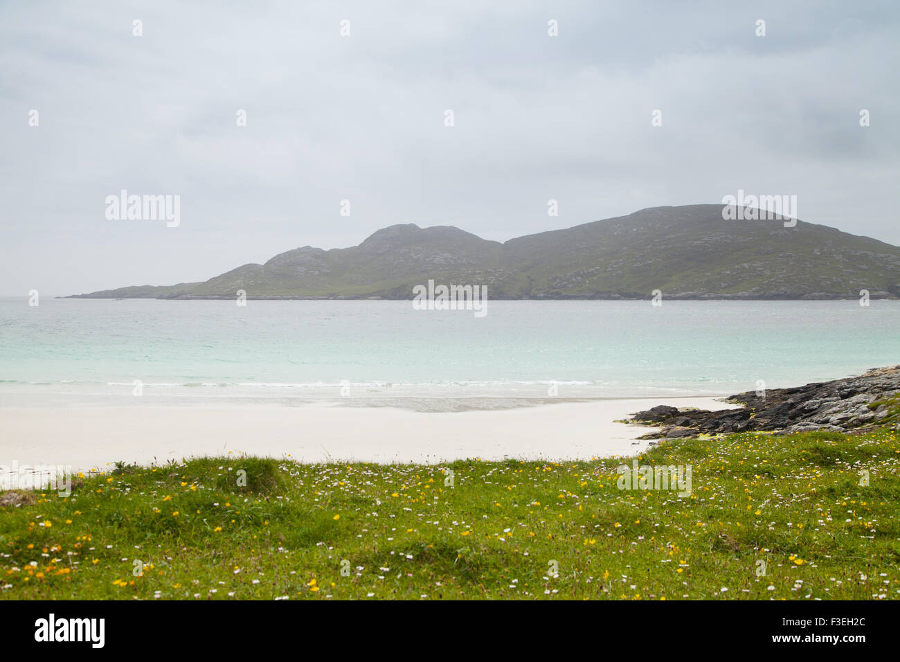 Looking South from the tip of Vatersay  over a white beach, Outer Hebrides Scotland Stock Photo