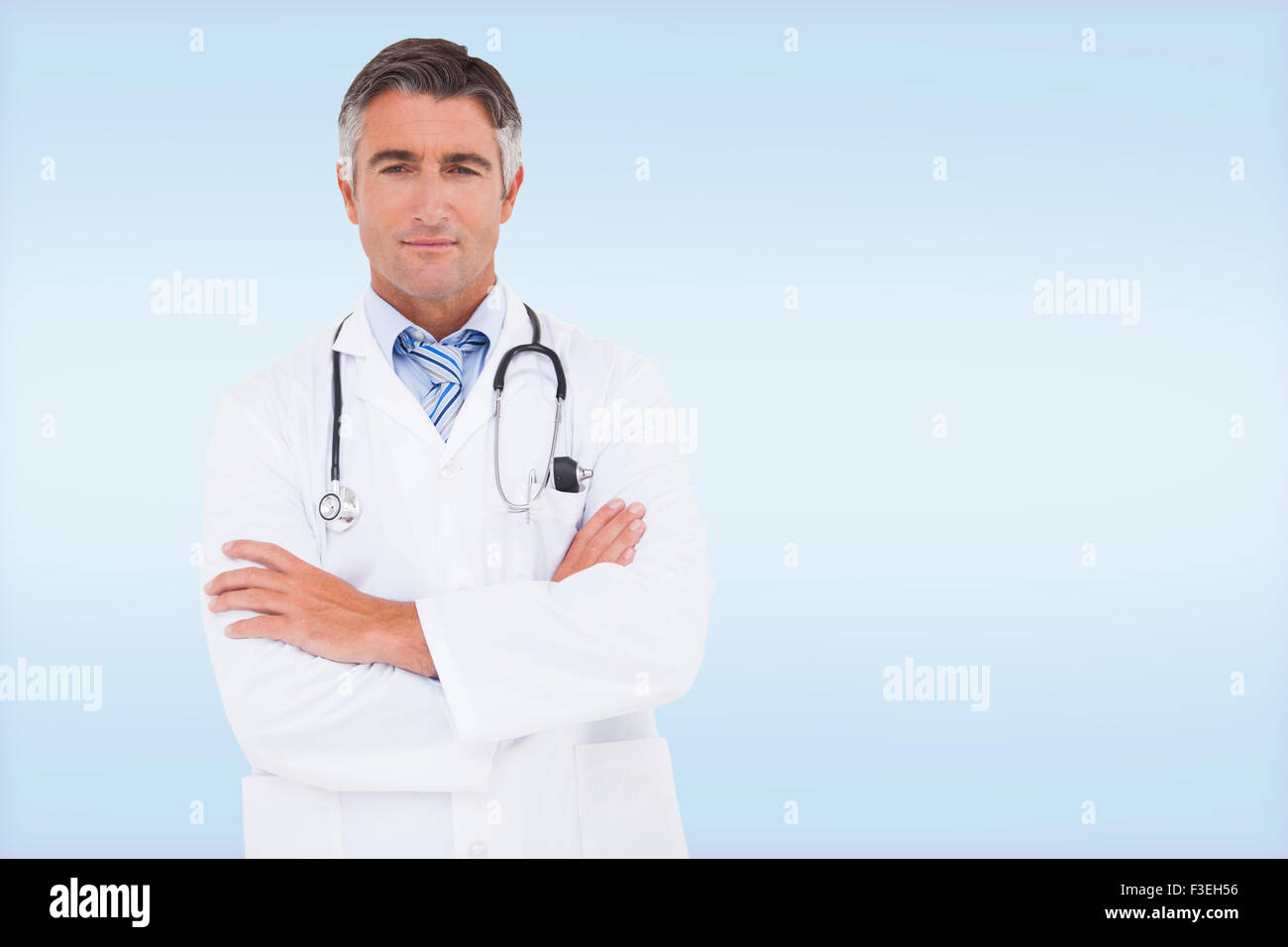 Serious mature male doctor hi-res stock photography and images - Alamy