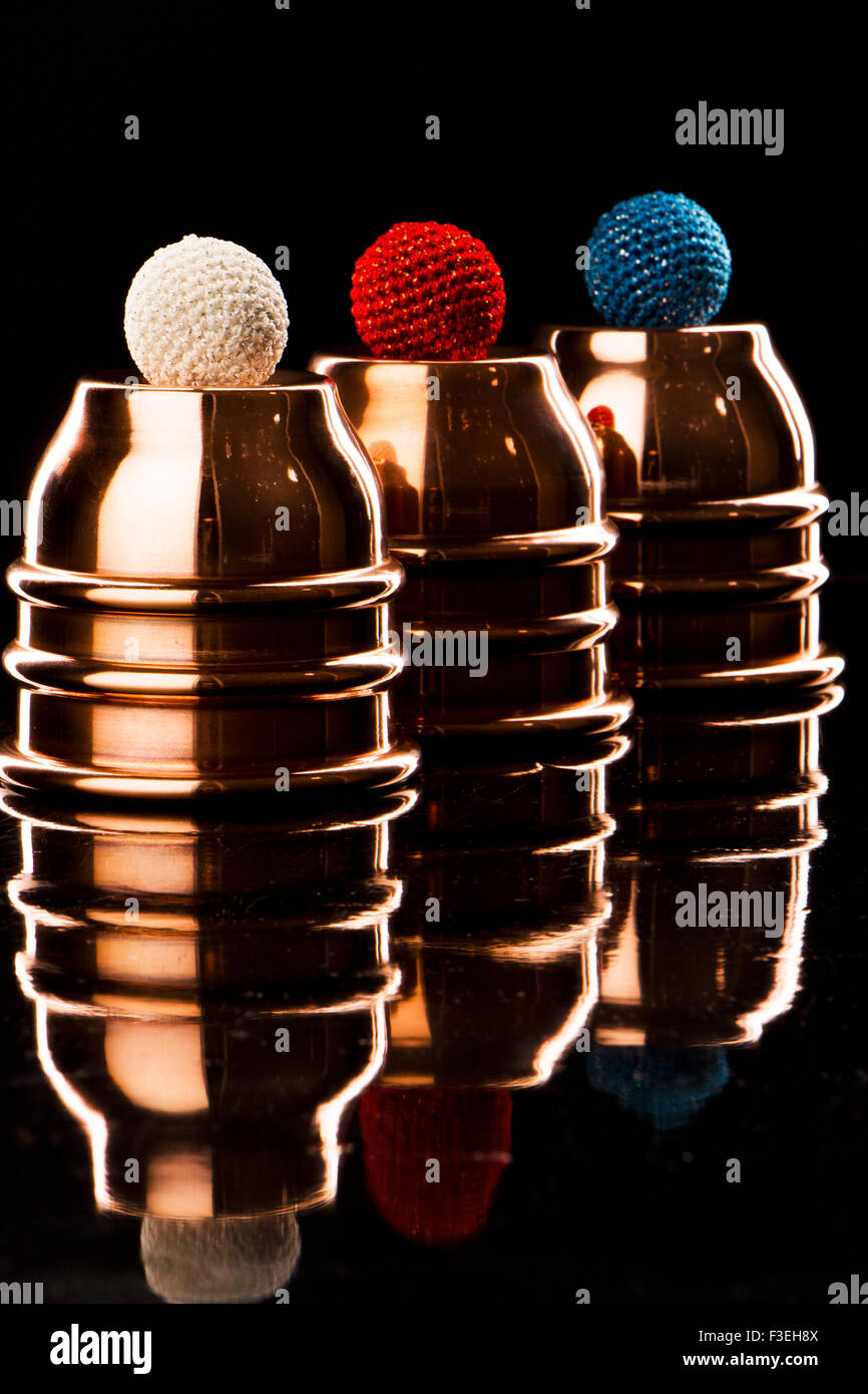 Magic tricks cups and balls Stock Photo Alamy