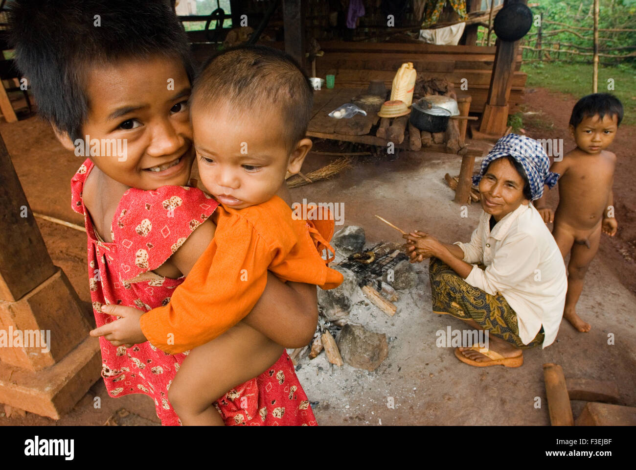 Family of minority ethnic Khmer Leu. Kateung village. Ratanakiri. Ratanakiri is located in Cambodia's far northeast bordered by Stock Photo