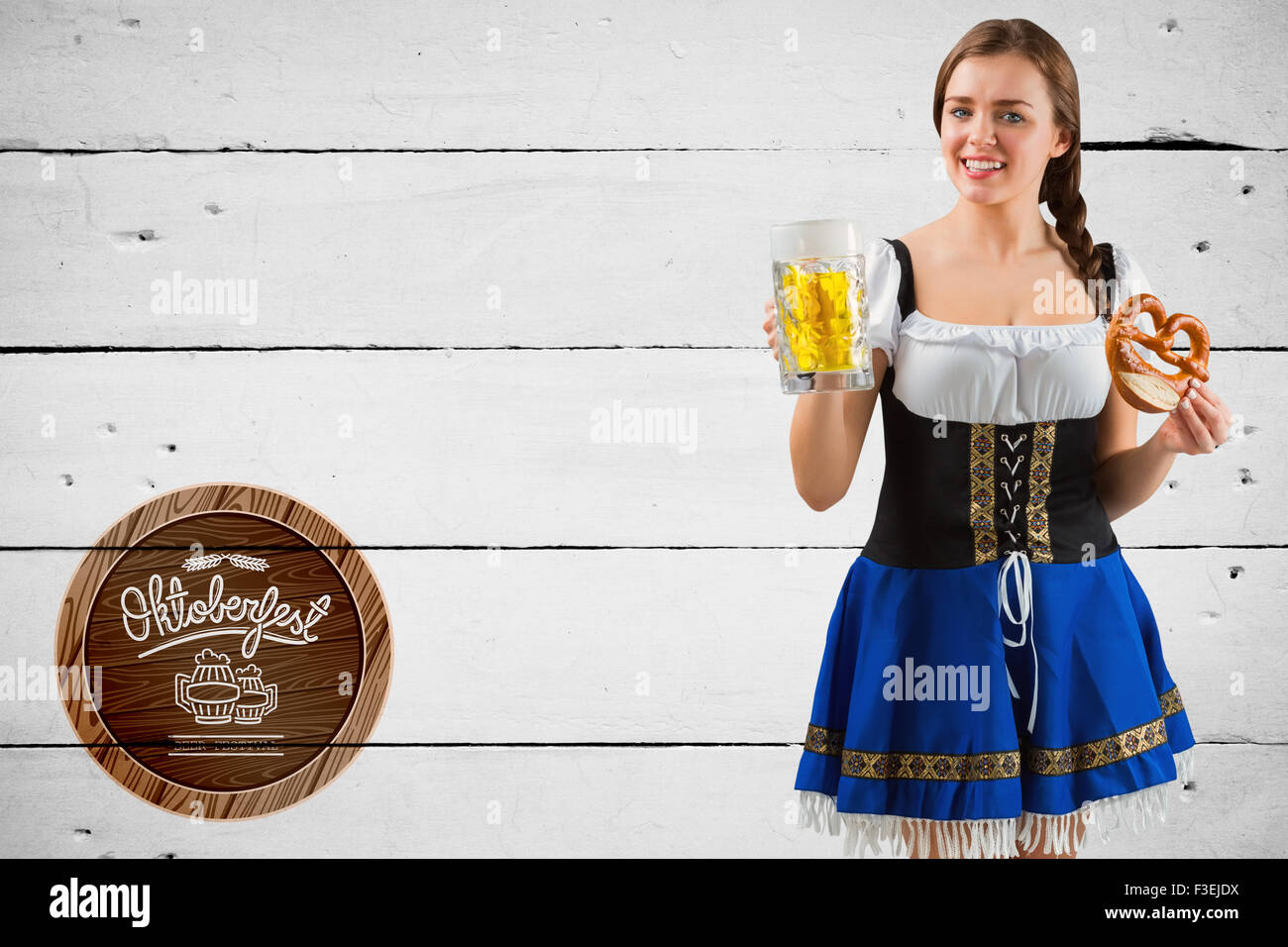 Composite image of oktoberfest girl holding beer and pretzel Stock Photo