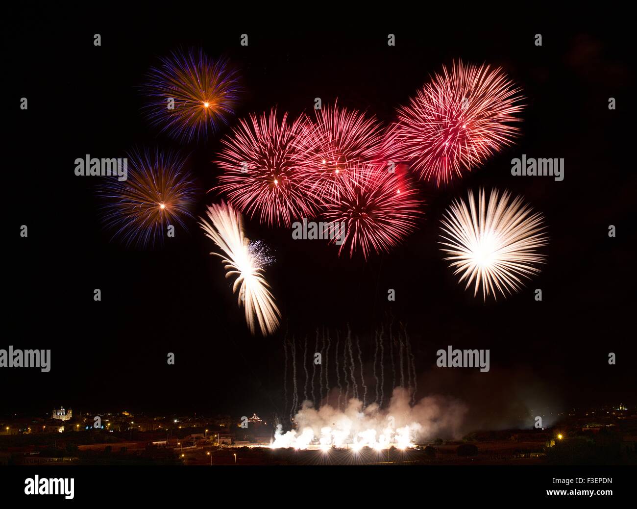 Big colorful fireworks explode in Malta in dark sky,Malta fireworks festival, 4 July, Independence, fireworks explode, New Year, Stock Photo