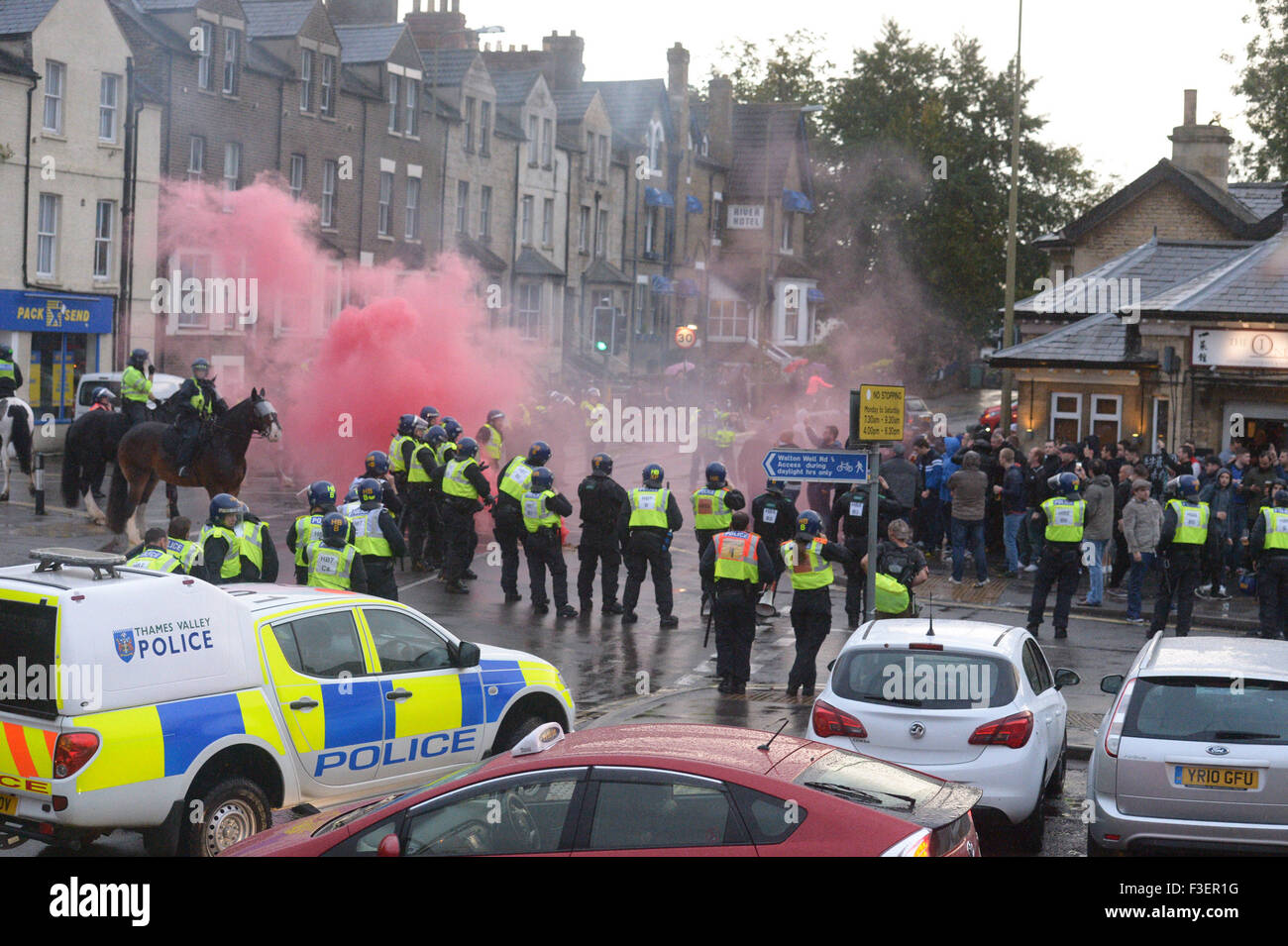 Swindon fans clash with police ahead of their derby match with Oxford Stock Photo