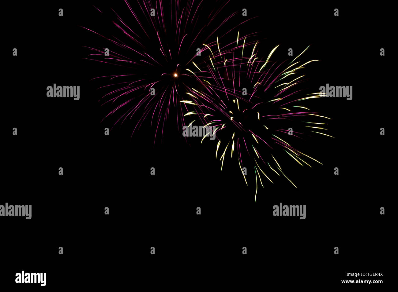 Festive and colorful fireworks against a black background - 5 Stock Photo