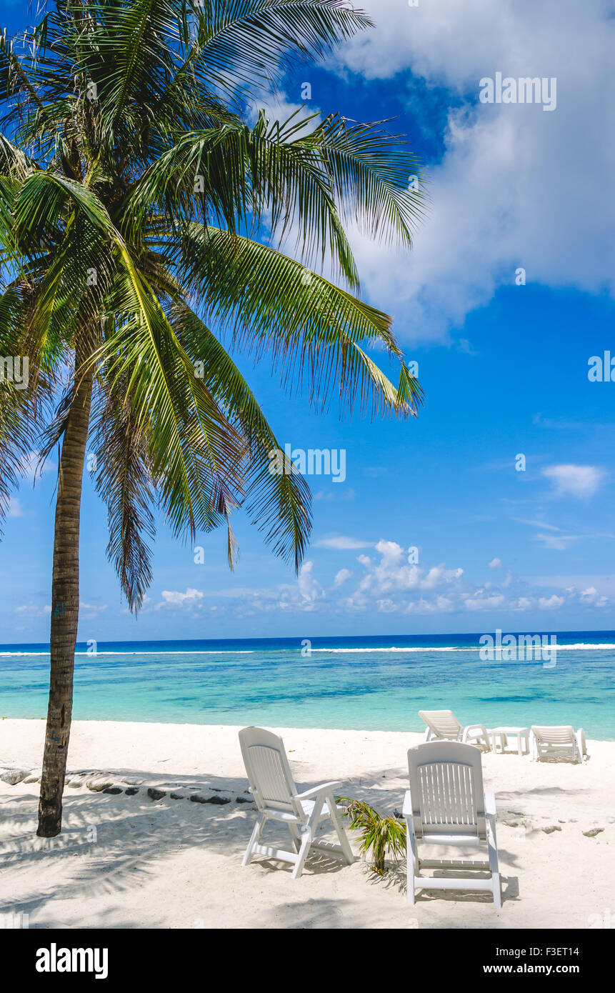 Two beach chairs on perfect tropical white sand beach in Maldives Stock ...