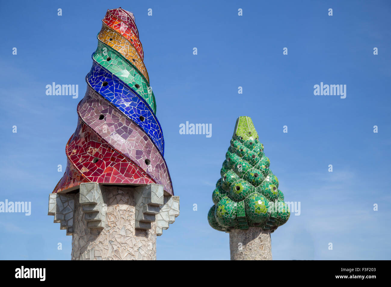 Barcelona, Spain - September 25, 2015: Gaudi Chimney, Palau Guell, Gaudi broken tile mosaics and strange decorated chimneys are Stock Photo
