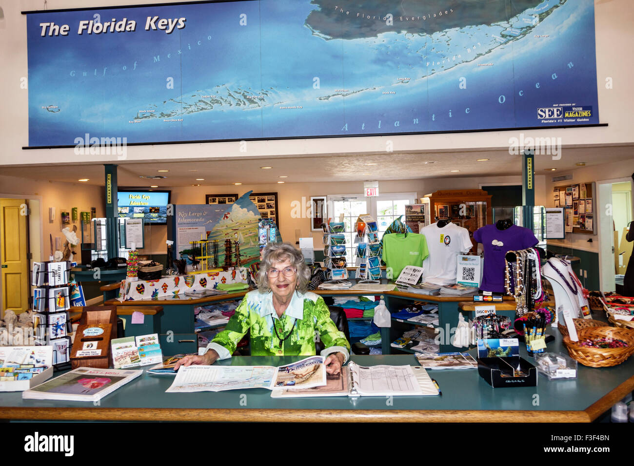 Key Largo Florida Keys,Visitor Center,centre,interior inside,help desk,information,senior seniors citizen citizens,woman female women,volunteer volunt Stock Photo