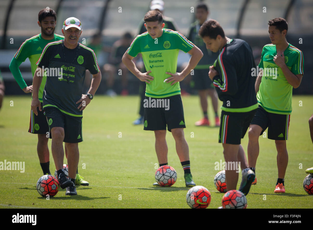 (151007) -- MEXICO CITY, Oct. 7, 2015 (Xinhua) -- Mexico's national soccer team coach Ricardo Ferretti (L-Front), and players Carlos Vela (L-Back), Hector Herrera (C) and Carlos Esquivel (R), take part in a training session at High Performance Center of the Mexican Football Federation (CAR-FEMEXFUT, for its acronym in Spanish), in Mexico City, capital of Mexico, Oct. 6, 2015. Mexican national soccer team held a training session on Tuesday ahead its match against the United States national soccer team for a spot in the Confederations Cup Russia 2017, to be played on Oct. 10 at Rose Bowl stadium Stock Photo
