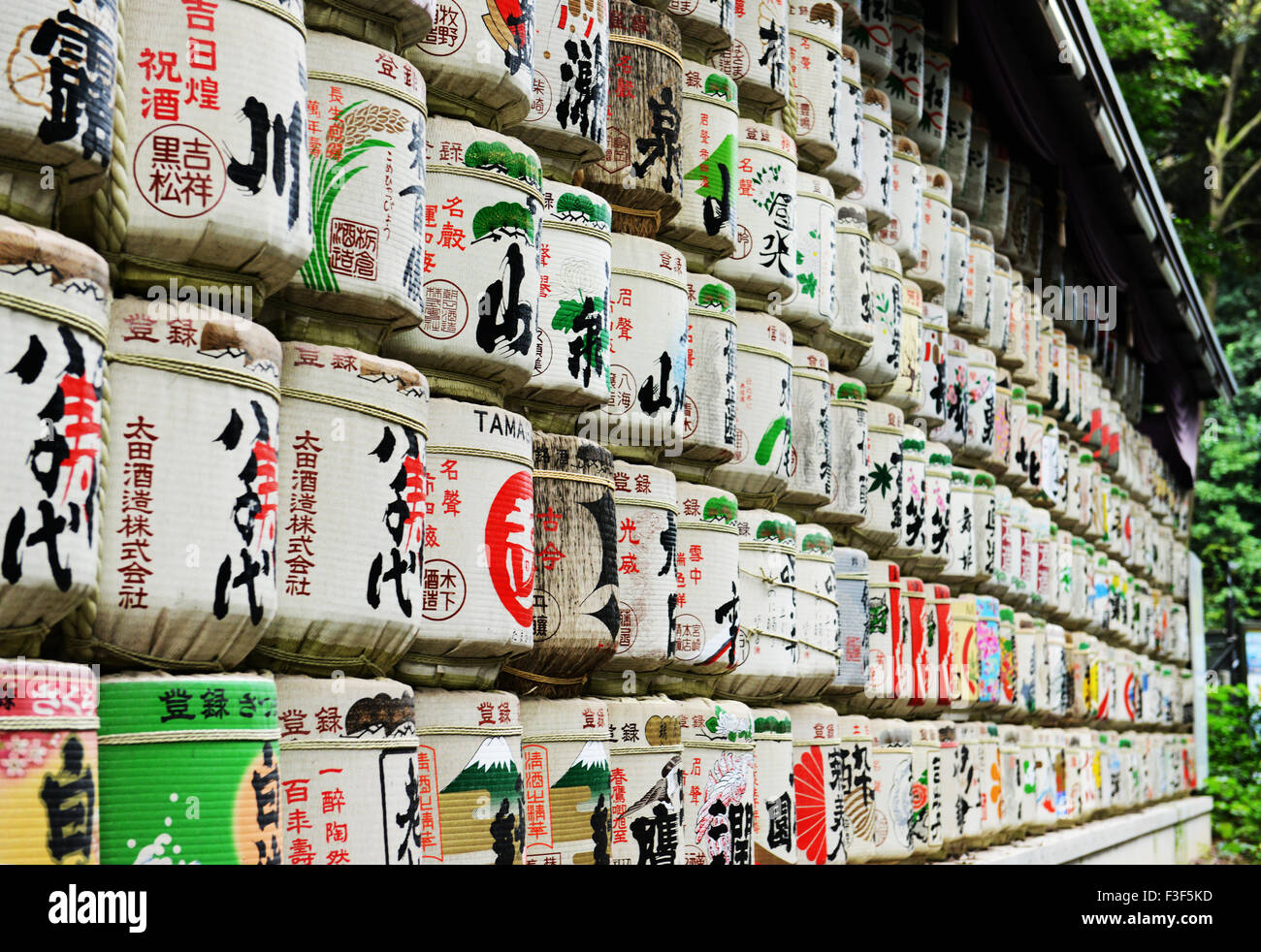 Decorated sake barrels at the entrance to the Meiji Shrine in Tokyo. Stock Photo