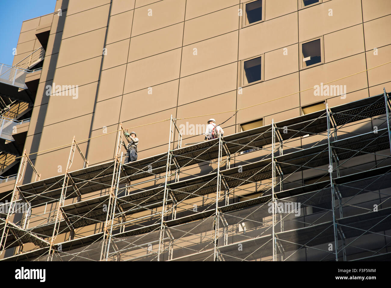 Workers at high place,Shinjuku-Ku,Tokyo,Japan Stock Photo