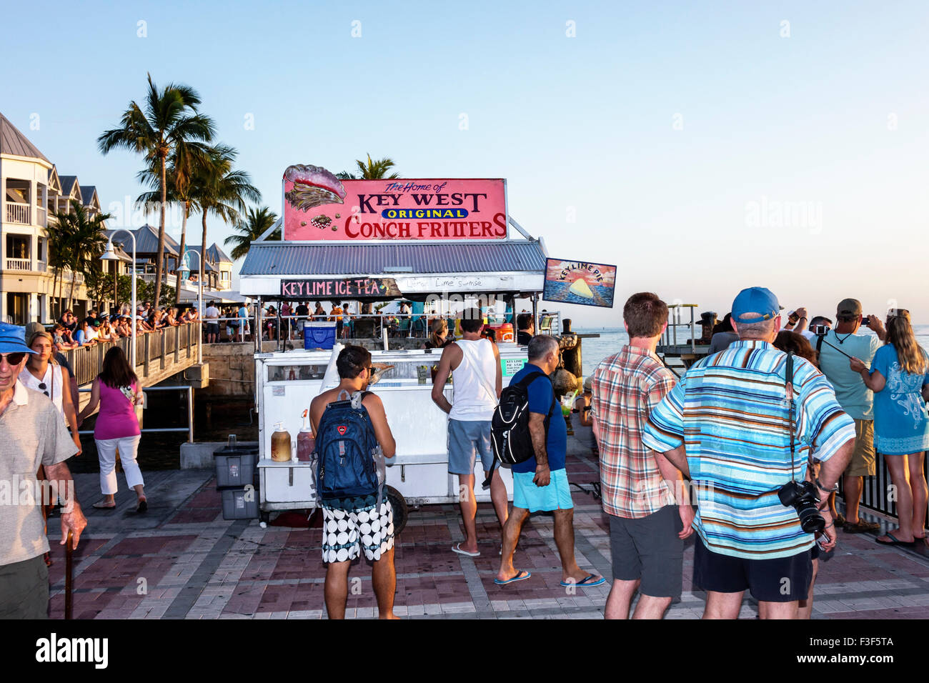 Key West Florida,Keys Mallory Square Dock,sunset celebration,festival,foodstall,stalls,booth,booths,vendor,vendors,conch fritters,display case sale,FL Stock Photo