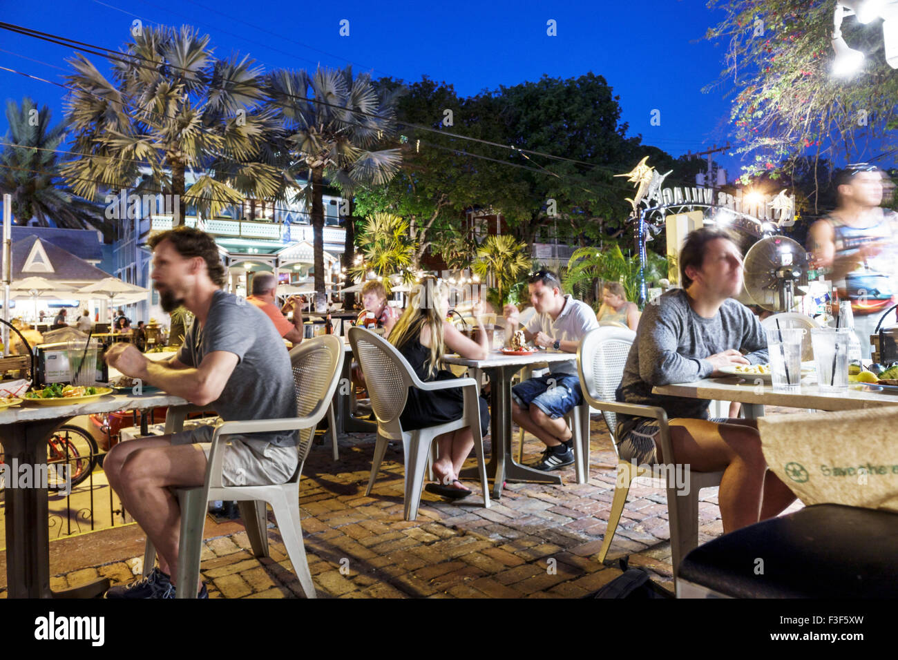 Key West Florida,Keys Old Town,Duval Street,night nightlife evening after  dark,Caroline's Cafe,restaurant restaurants food dining eating out cafe  cafe Stock Photo - Alamy