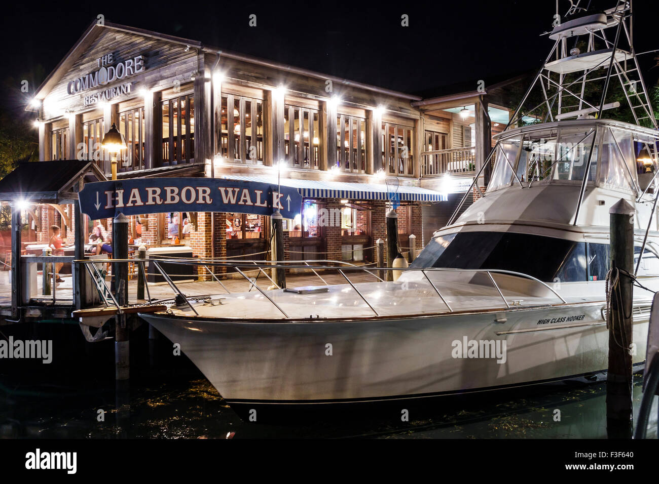 Key West Florida Keys,Old Town,Harbor Walk,harbour,bight,night evening,yacht,boat,The Commodore,restaurant restaurants food dining cafe cafes,FL150508 Stock Photo