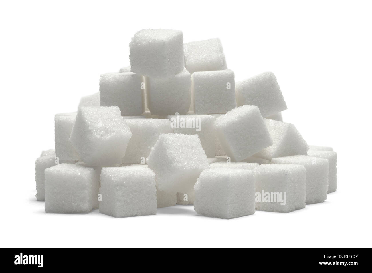 Heap of Sugar Cubes Isolated on White Background. Stock Photo