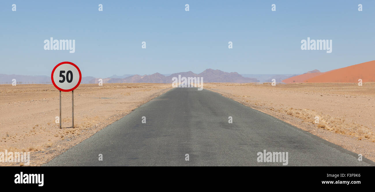 Speed limit sign at a desert road in Namibia speed limit of 50 kph or mph Stock Photo Alamy