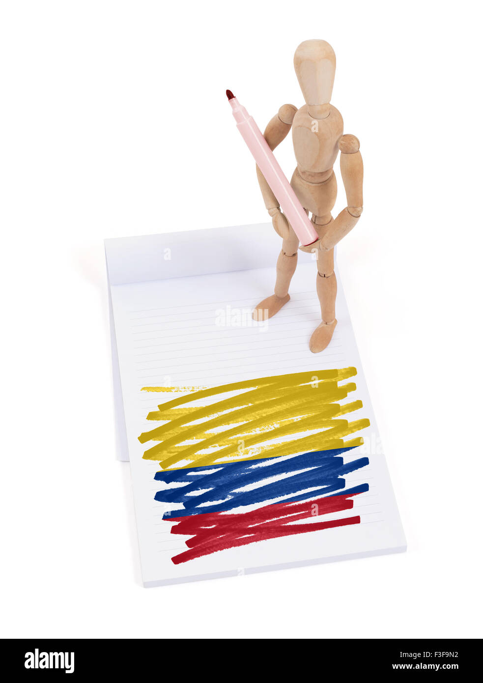 Wooden mannequin made a drawing of a flag - Colombia Stock Photo