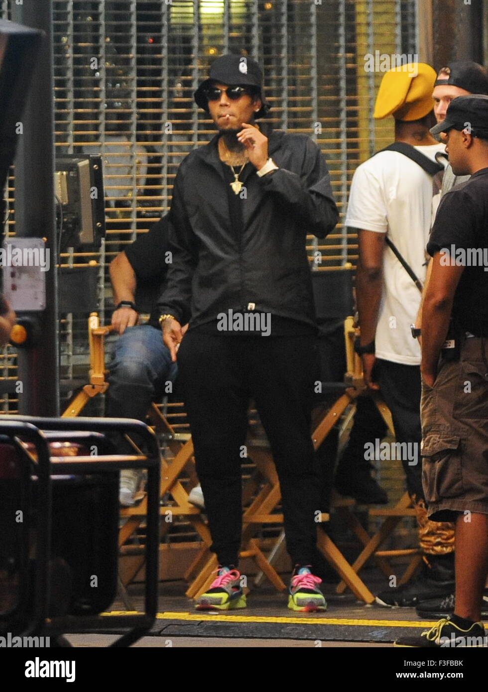 Singer Chris Brown Hops Out Of A Sports Car On The Set Of His New Stock Photo Alamy