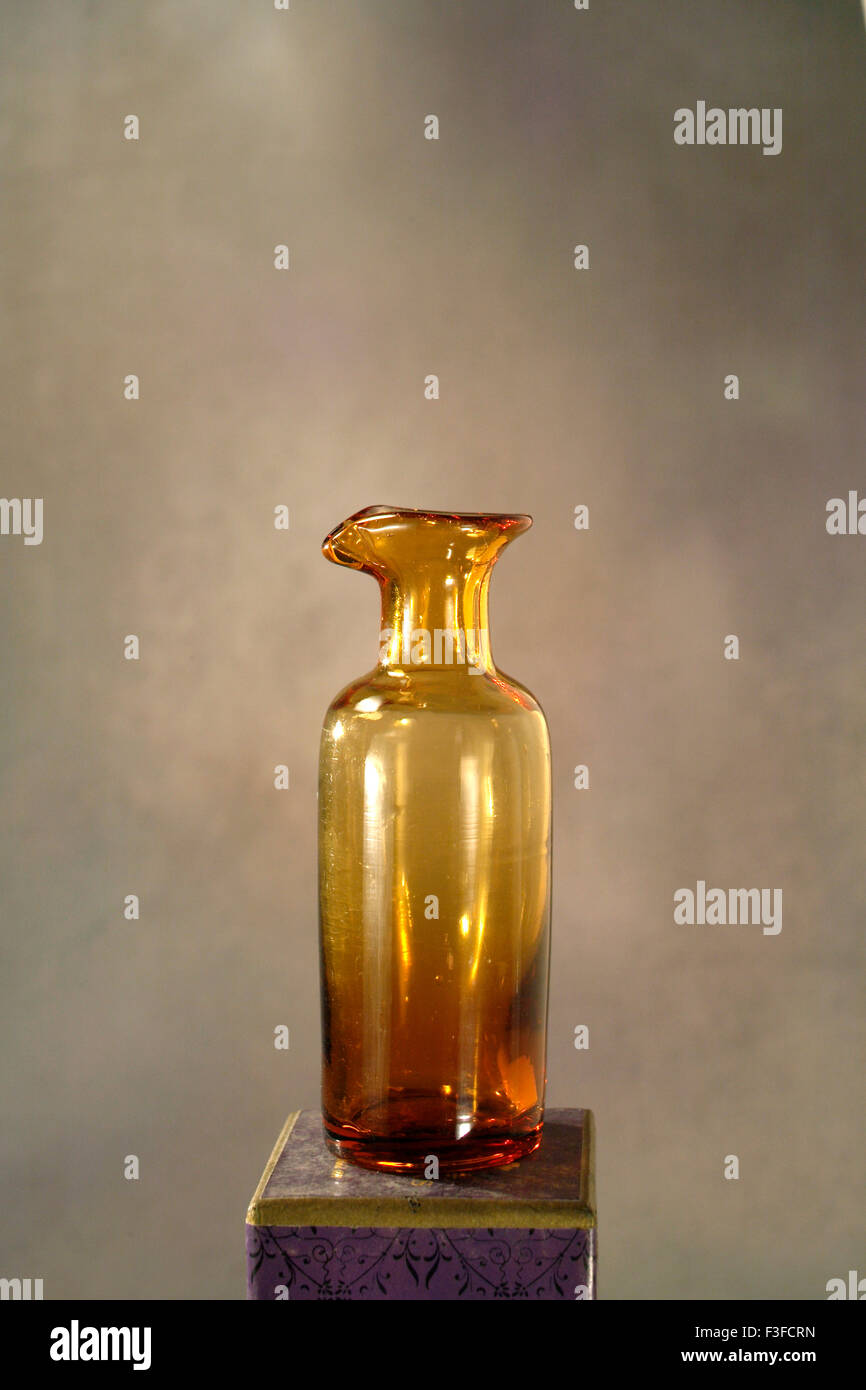 Art classic glass works bottle with abstract background Stock Photo