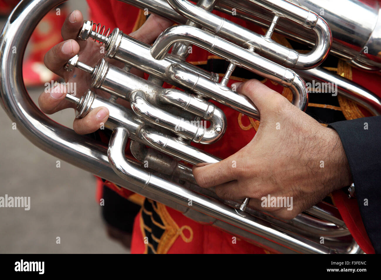 Musical Blowing instrument Euphonium ; Artist playing Euphonium in a Band ; during the religious procession Stock Photo