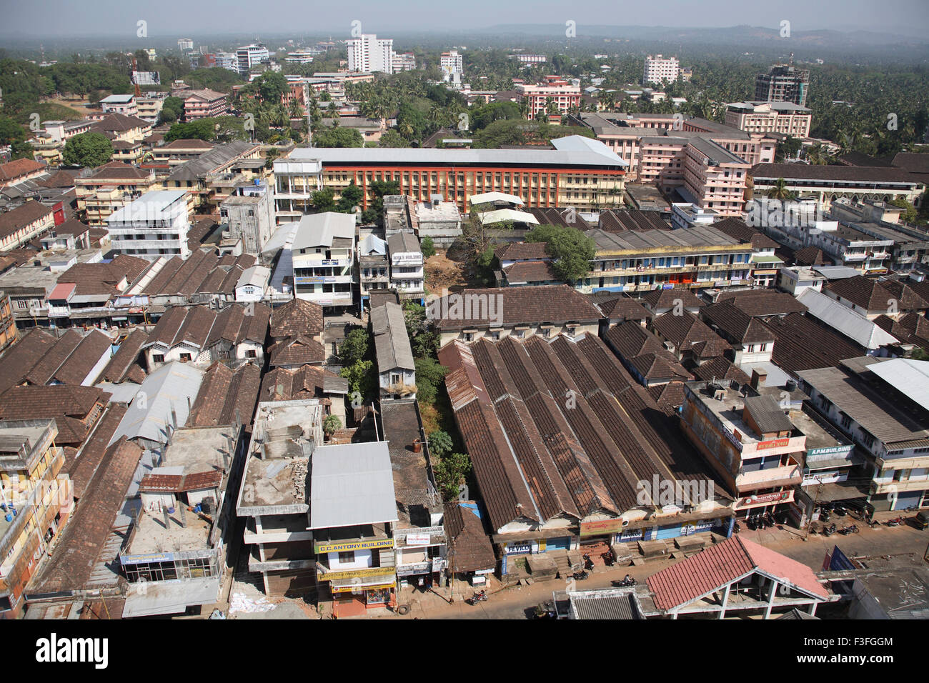 View from top floor of 260 feet high Bible tower new construction seen roof made with tiles prominent Thrissur Kerala Stock Photo