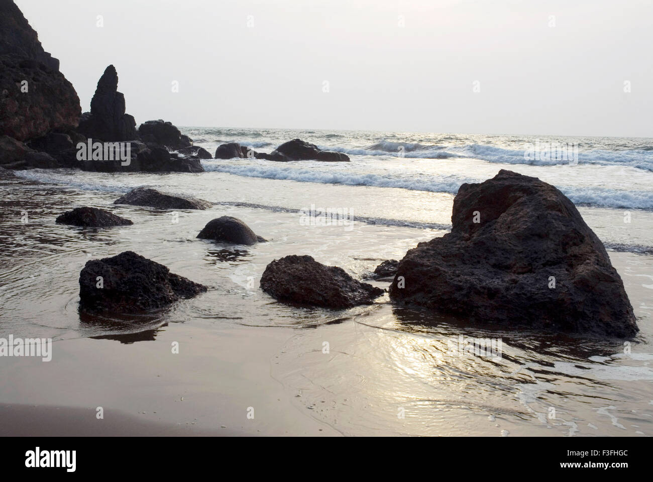 Boulders Bhate beach at Ratnagiri ; Maharashtra ; India Stock Photo