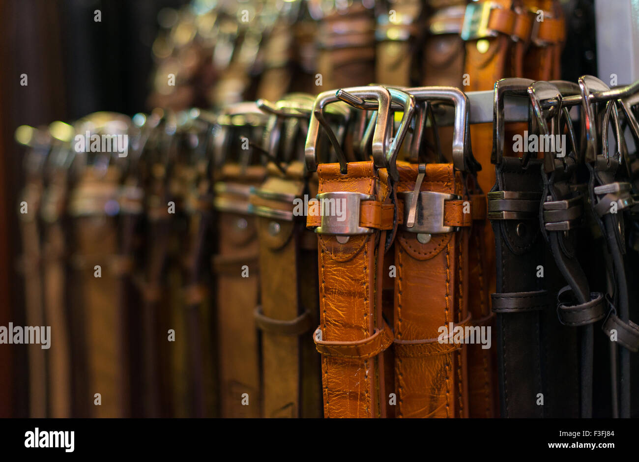 Leather belts collection in the store Stock Photo Alamy
